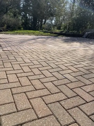 The finished driveway, clean across the full width